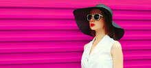 Portrait Of Beautiful Young Woman Model Posing Wearing Black Hat, Sunglasses On Pink Background, Blank Copy Space For Advertising Text