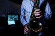 © Westend61 - Saxophonist playing saxophone in recording studio