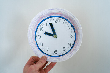 manual paper watch made of cardboard plate