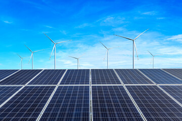 Wall Mural - Solar panels and wind turbines landscape under blue sky. Green energy concept.