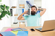 © be free - Happy businessman relaxing during coffee break in office, relaxation