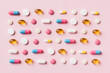 Many different pills and space for text on colorful background, top view. Different pills on color background, flat lay