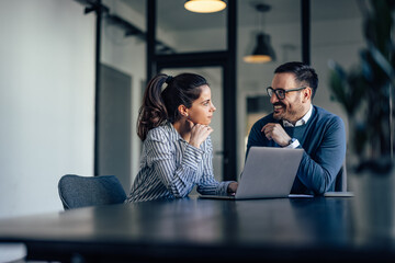 Wall Mural - Business people, looking at each other, having a conversation.