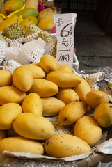 Poster - Group of mangoes for sale in Hong Kong dry market