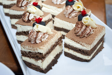 Sticker - Portions of cake served on plates for graduation party, dessert in Guatemala hotel