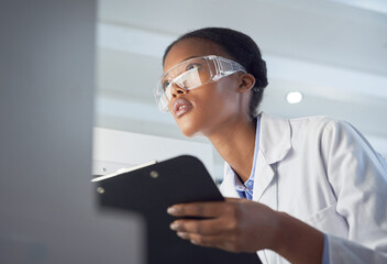 Every contribution is a contribution that matters. Shot of a young scientist using a computer while conducting research in a laboratory.