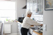 © pikselstock - Shot of a senior woman in her kitchen