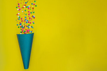 festive cracker on a yellow background