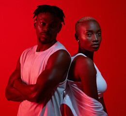 Were what you need to get your brand out there. Red filtered shot of a sporty young man and woman posing together in the studio.