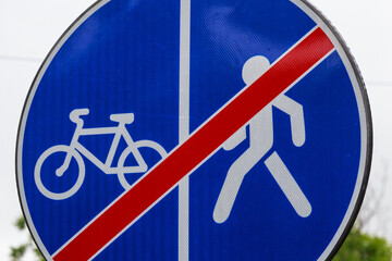 Road sign end of the pedestrian zone and the bike path. Background with copy space