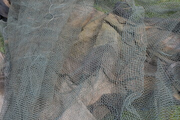 Fishing traps, or nets generally used for fish farming in large ponds such as oceans and lakes.