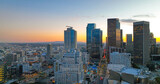 Fototapeta  - Los Angeles skyline and skyscrapers. Downtown Los Angeles aerial view, business centre of the city, downtown skyline at sunset.