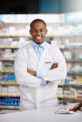 Poster - Looking for expert advice Im right here to help. Portrait of a young pharmacist working in a chemist.