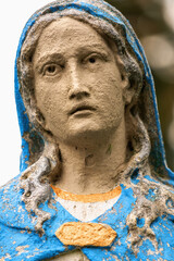 Fototapete - Fragment of an ancient statue of Virgin Mary. Vintage sculpture of sad woman in grief
