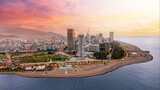 Fototapeta  - Drone photo of coast Batumi city at pink sunset