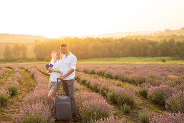man and woman travel lifestyle and passengers passport in a lavender field