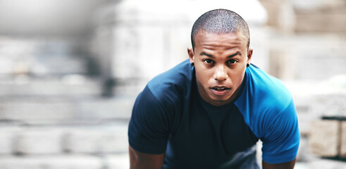 Having a strong mentality is his biggest strength. Portrait of a handsome young sportsman exercising outdoors.