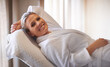 © Alexandra W/peopleimages.com - Rejuventated at the wellness center. Cropped shot of a woman in a day spa relaxing on a massage table.