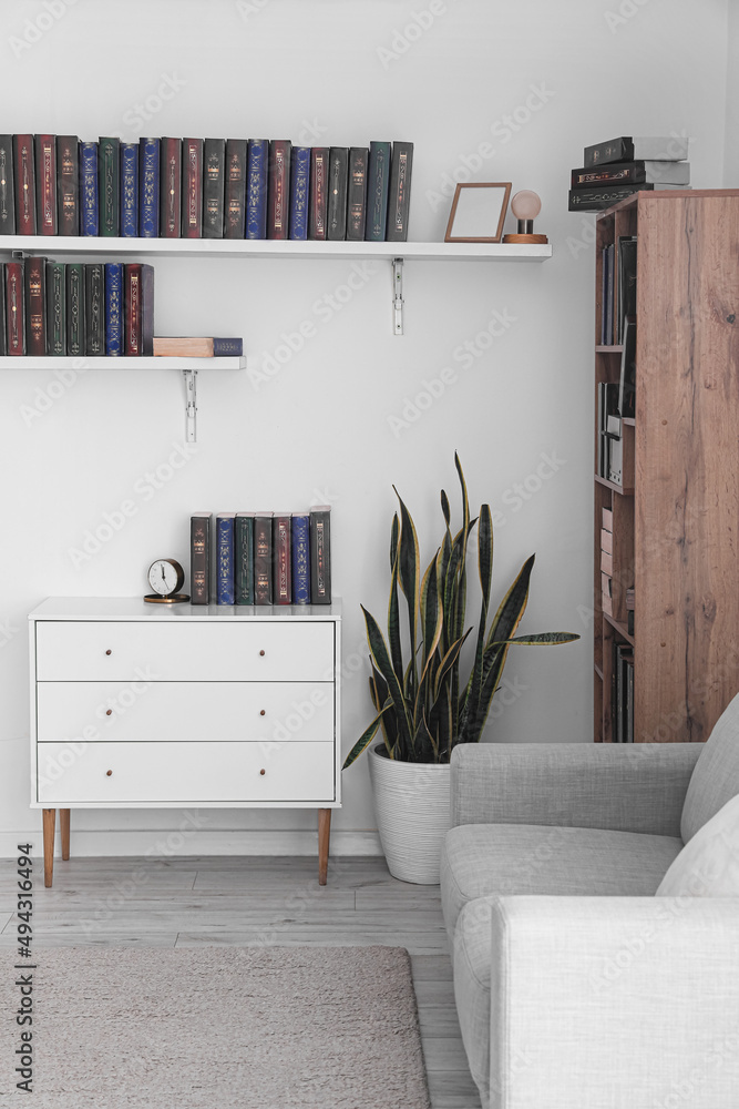 Bookcase with shelves in modern interior of room