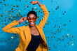 © deagreez - Portrait of funky crazy lady arm touch glasses clubbing fly star confetti isolated on blue color background