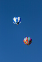Vertical Shot Of Hot Air Balloons In The Bright Sky In Albuquerque, USA