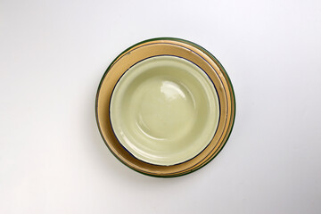 Enamel tin metal food plate pot bowl retro vintage tableware dinnerware on white background top view