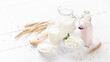 © gudzar - Organic dairy products on a white wooden background