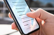 © terovesalainen - Email inbox in phone outdoors. List of new unread messages or spam mail. Marketing newsletters. Man looking at digital mobile posts account with smartphone. Person reading work text with cellphone.