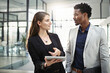 © Alexandra/peopleimages.com - You follow. Cropped shot of two businesspeople looking at a tablet in the office.