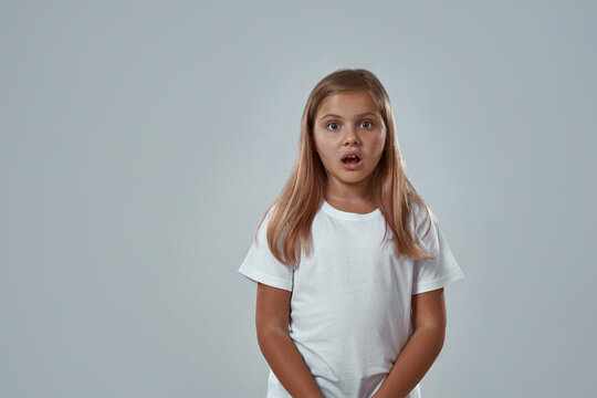 Cropped of scared little girl with open mouth