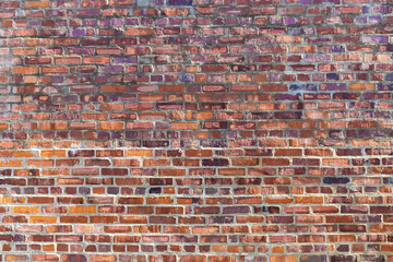 Wall Mural - Closeup shot of old grunge dark red brick texture details with pattern background.