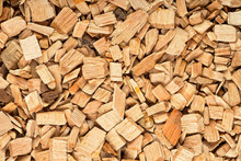 Pile Of Wood Chips As Background, Top View. Wooden Chips For Smoking Meat And Fish.