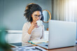 © Arnéll Koegelenberg/peopleimages.com - Shes her own boss. Shot of a young woman working on a laptop at home.