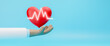 Cardiologist holding red heart with electrocardiogram, cardiovascular disease concept, early diagnosis, health care concept, cardiology concept, health insurance service concept, 3d rendering