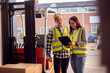 © Monkey Business - Supervisor Teaching Intern To Operate Fork Lift Truck In Modern Warehouse