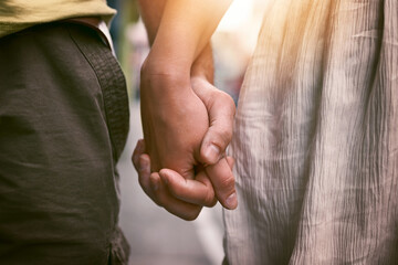 my hand will always have room for your hand. cropped shot of an affectionate couple holding hands ou