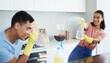 © Siphosethu F/peopleimages.com - Keep it light fresh and fun. Shot of a young couple taking a break from cleaning to play around.