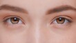 © pavel_dp - Macro close-up shot of young brunette woman opens her eyes and looks at camera
