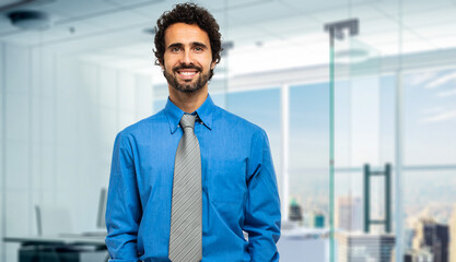 Portrait of a handsome businessman in a modern office