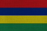 Fototapeta Tęcza - Patriotic textile background in colors of national flag. Mauritius