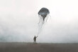 © fran_kie - Illustration of man holding big jellyfish blowing in the air, abstract fantastic dreamy concept
