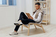 © SHOTPRIME STUDIO - man with a tablet sits in a chair communication Lifestyle