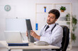 © Elnur - Young male doctor radiologist working in the clinic