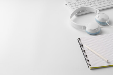 Canvas Print - Minimalistic white workplace with keyboard and notebook