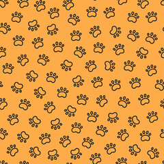 Seamless dog pattern with paw prints. Cat foots texture. Pattern with doggy pawprints. Orange dog texture. Hand drawn vector illustration in doodle style on orange background.