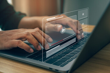 Businessman hands using laptop for streaming online, watching video on internet.