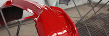 Painted Red Bumpers To Drying In Workshop Closeup