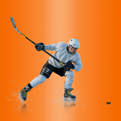 Professional ice hockey player hitting puck for winning goal in action on gradient multicolored neon background. Concept of sport competition.