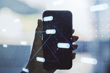 Wall Mural - double exposure of abstract programming language hologram and hand with cell phone on background, re