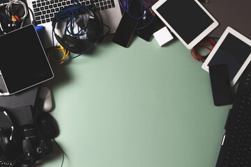 top view to old laptop computers, digital tablets, mobile phones, many used electronic gadgets devic